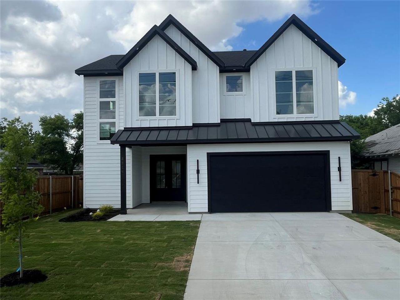 Front exterior of a new home in , Dallas, TX, highlighting curb appeal (Image 2).