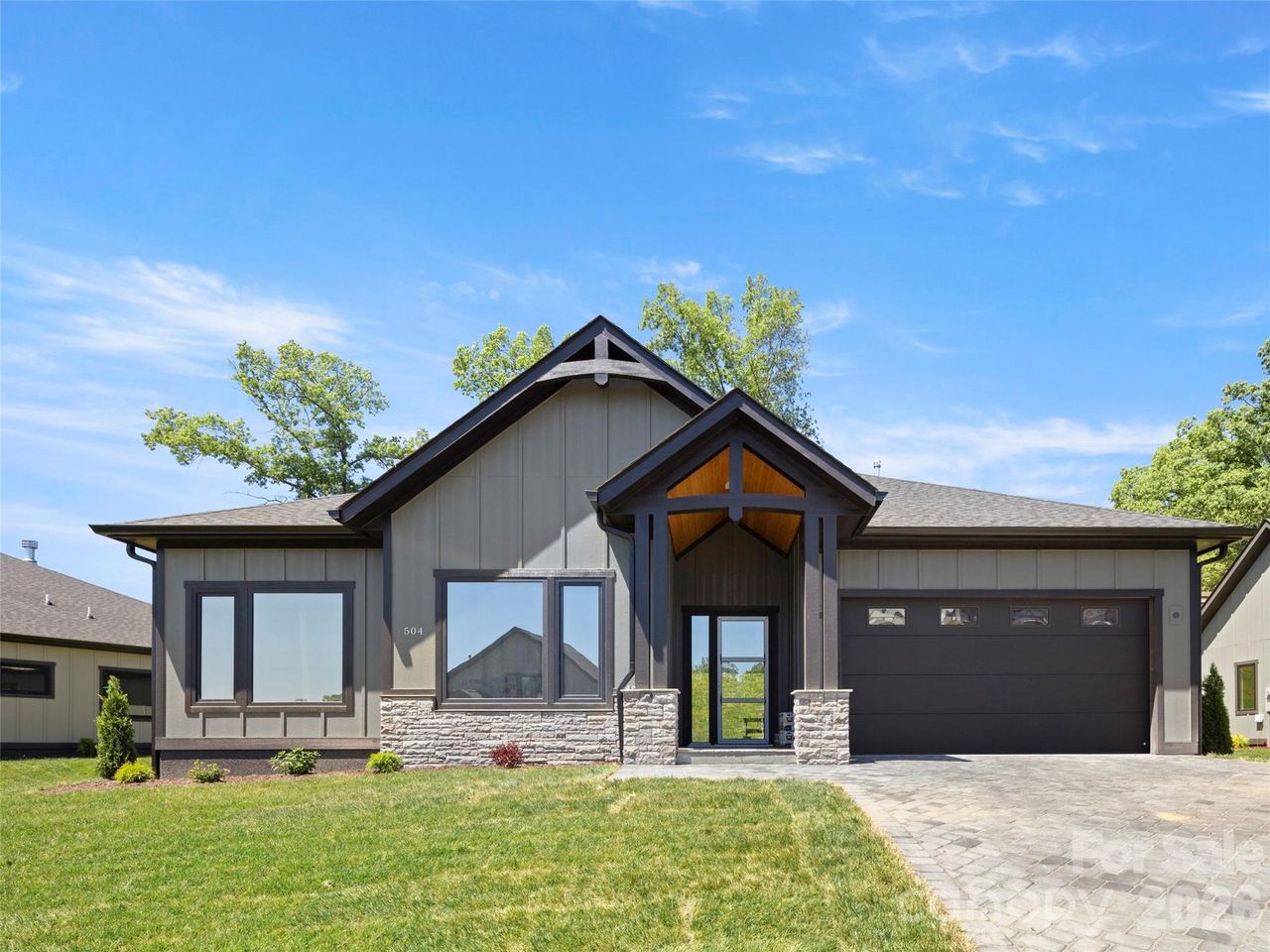 Front exterior of a new home in , Arden, NC, highlighting curb appeal (Image 2).