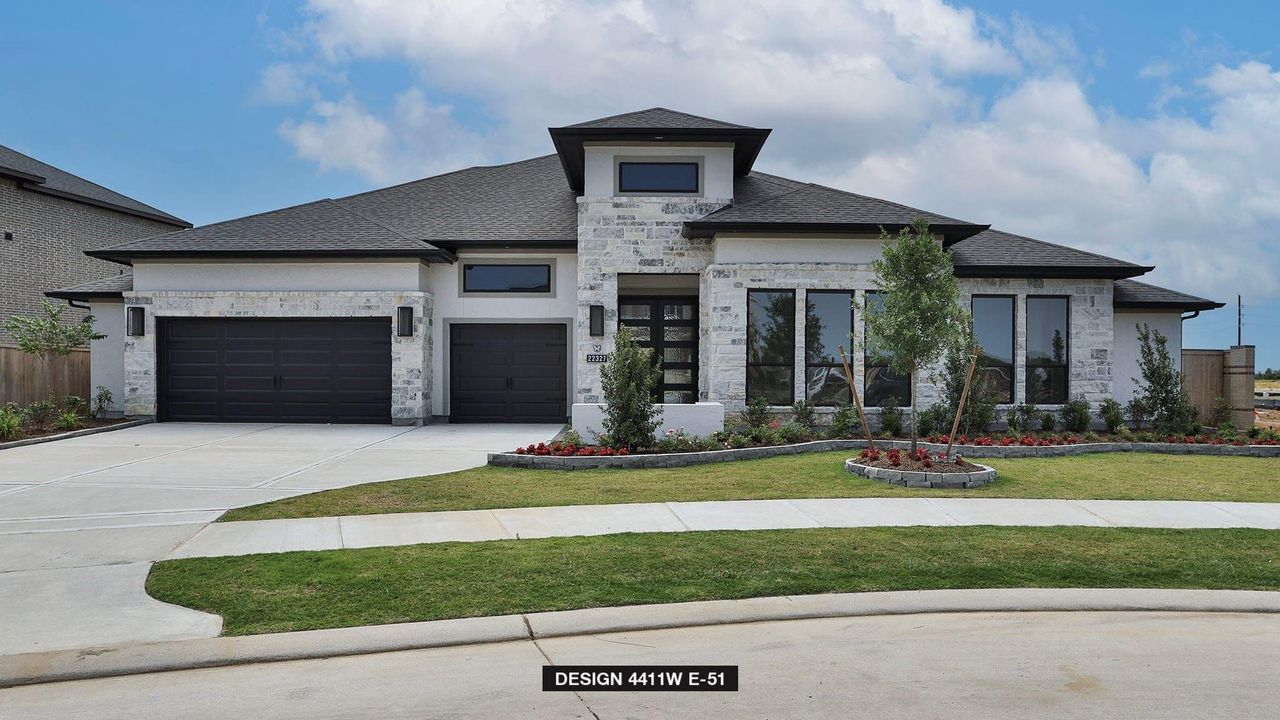 Front exterior of a new home in Bridgeland, Cypress, TX, highlighting curb appeal (Image 2).