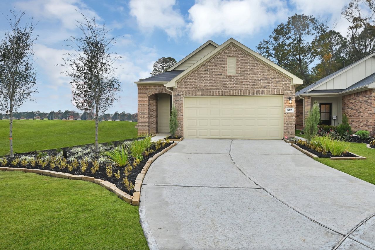 Representative exterior photo of a completed home built from the 1689 by Colina Homes in Mill Creek Trails, Magnolia, TX (Image 2).