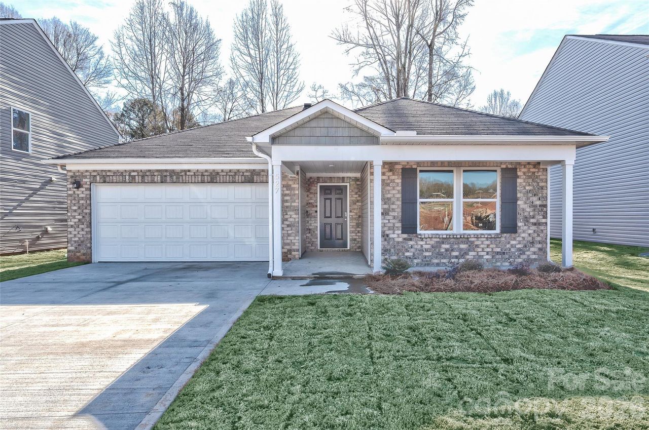 Front exterior of a new home in Frey Creek, Spartanburg, SC, highlighting curb appeal (Image 2).