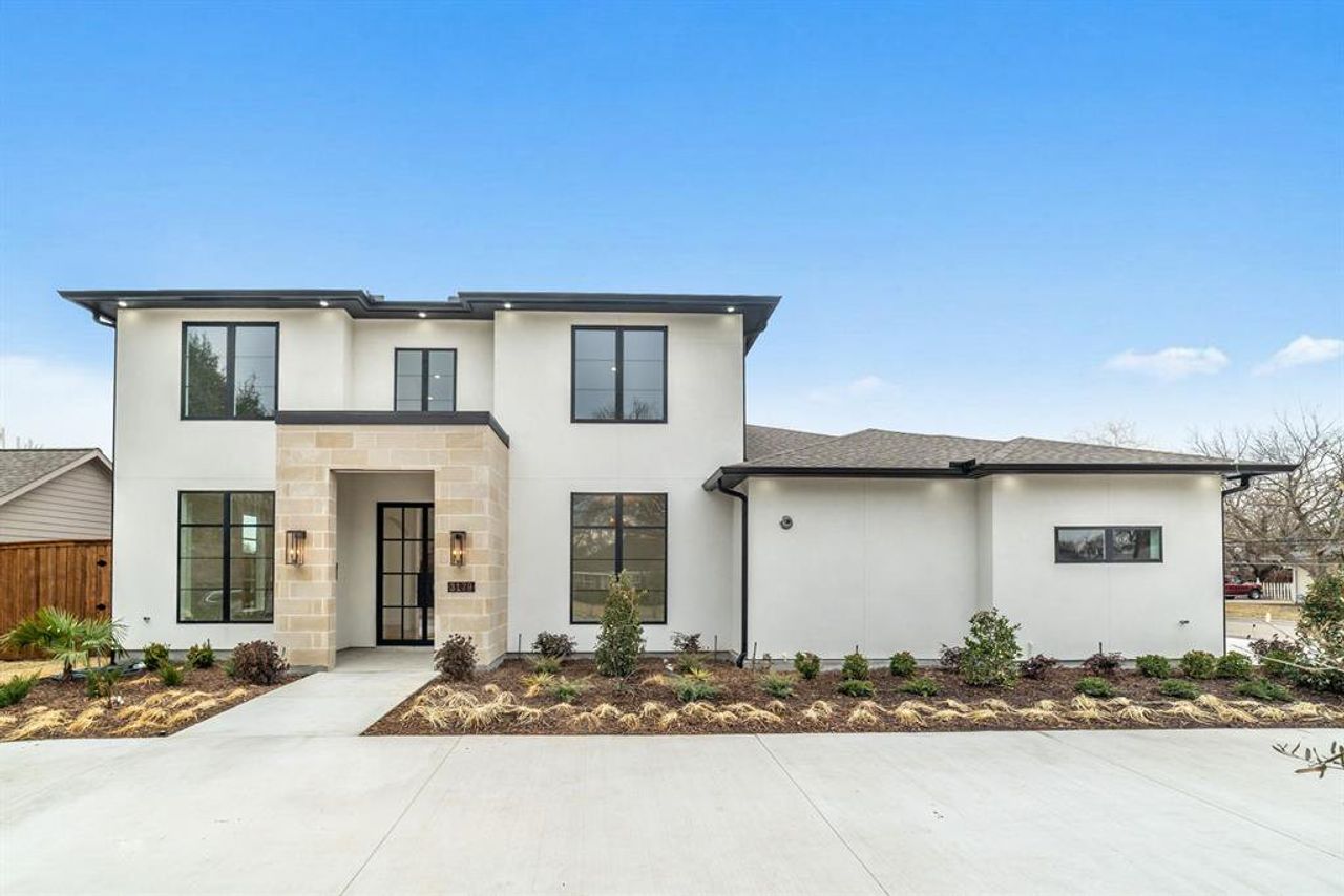 Front exterior of a new home in , Dallas, TX, highlighting curb appeal (Image 2).