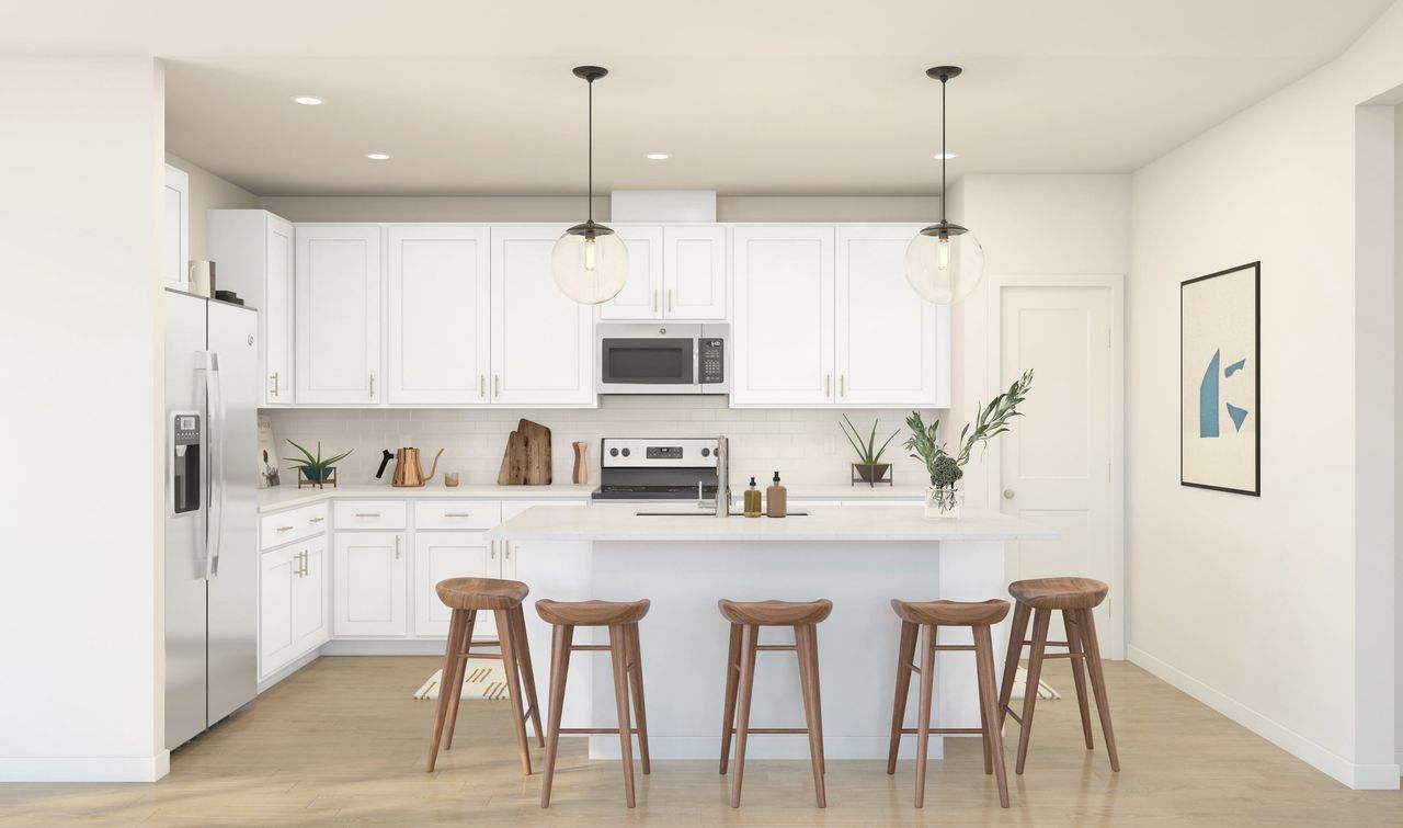 Kitchen with vast island & pendant lights Kitchen with vast island & pendant lights