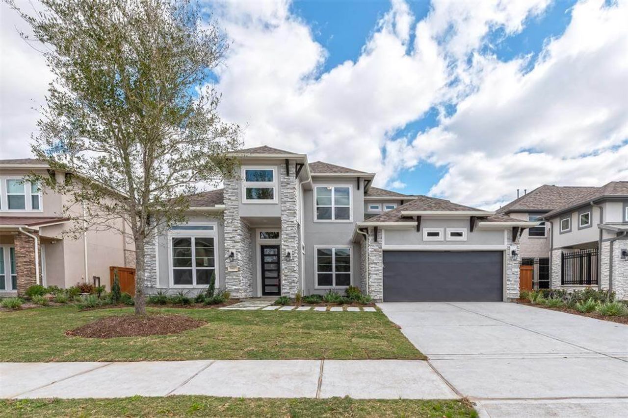 Representative exterior photo of a completed home built from the McKenzie 3437 by J. Patrick Homes in Artavia 70′ Lots, Conroe, TX (Image 2).