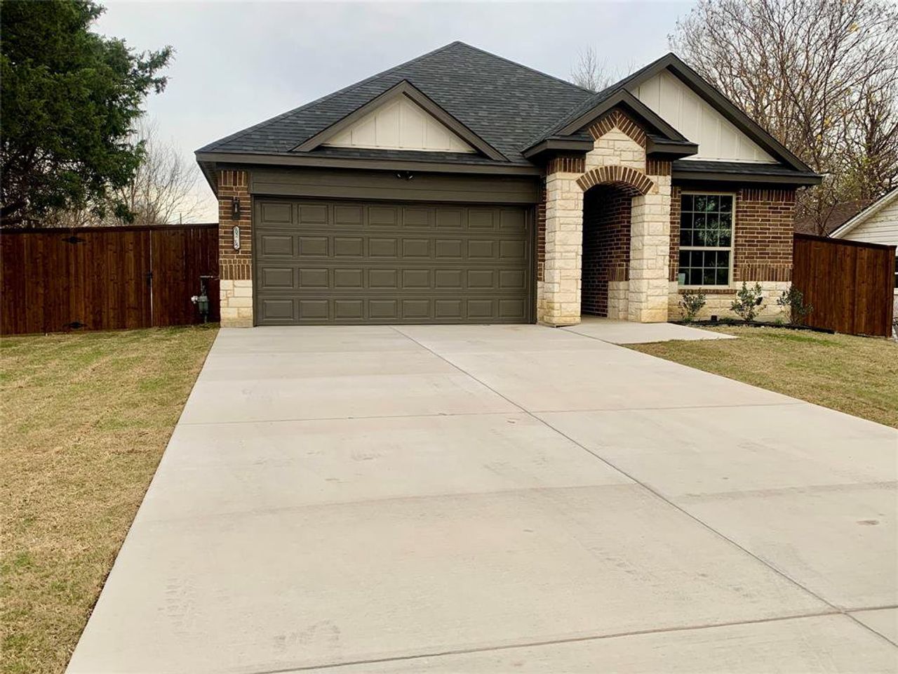 Front exterior of a new home in , Seagoville, TX, highlighting curb appeal (Image 2).