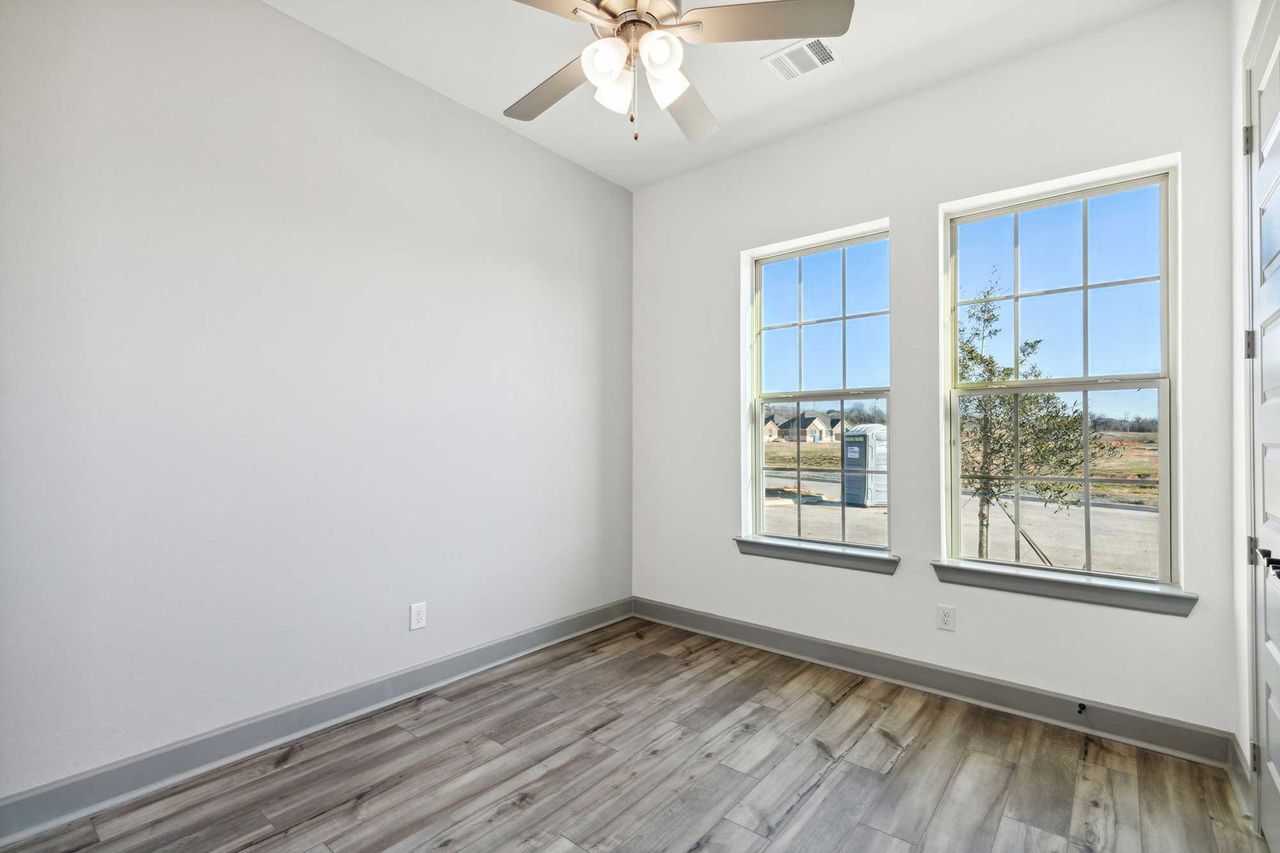Representative unfurnished interior of a home built from the The Cloverfield by David Weekley Homes in Elements at Viridian - Garden Series, Arlington (Image 2). Representative unfurnished interior of a home built from the The Cloverfield by David Weekley Homes in Elements at Viridian - Garden Series, Arlington (Image 2).