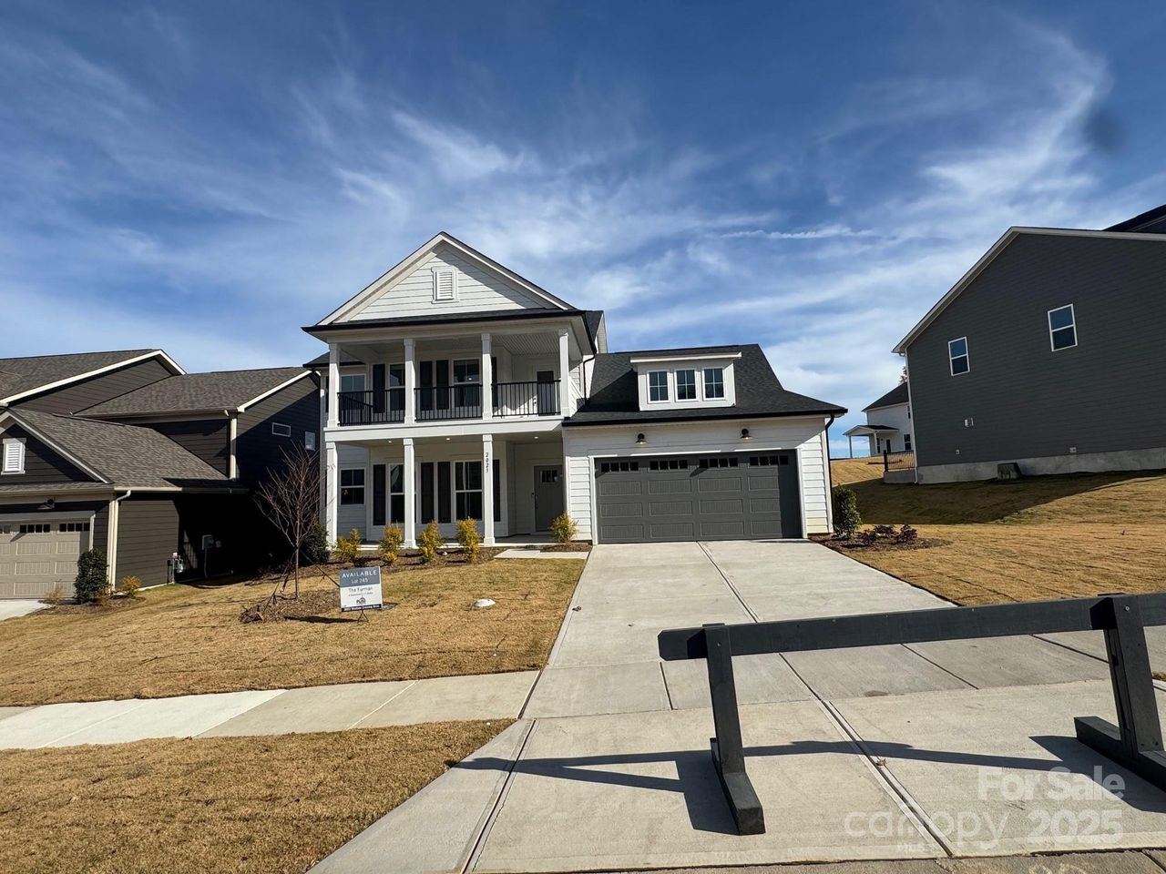 Front exterior of a new home in Forest Creek, Waxhaw, NC, highlighting curb appeal (Image 2).