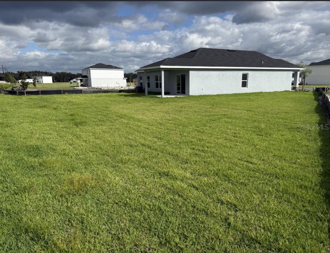 Exterior details and patio area of a home in Lakeside Preserve, Lakeland (Image 2).