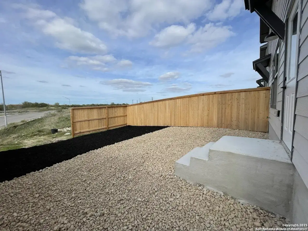 Exterior details and patio area of a home in Van Cleave, San Antonio (Image 2).