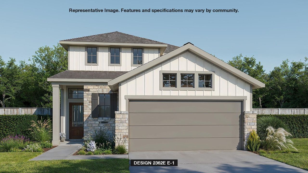 View of front of property featuring stone siding, fence, board and batten siding, and a shingled roof