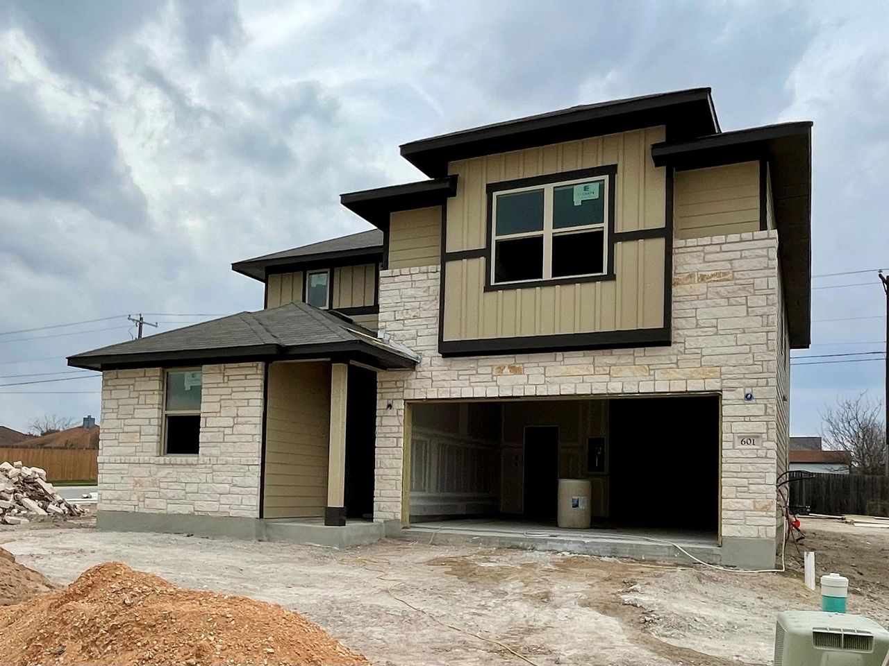 In-progress construction of a new home in Covered Bridge, Hutto, TX (Image 2).