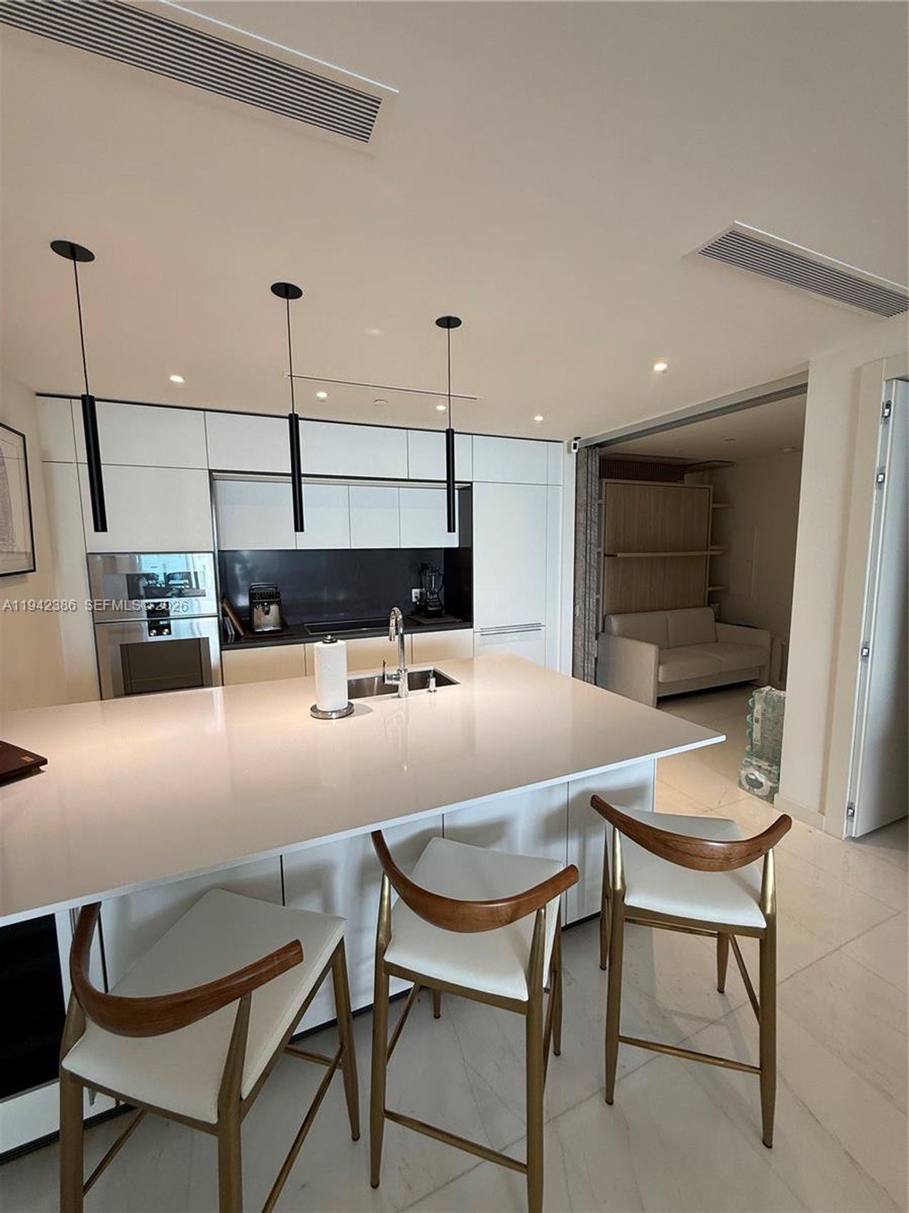 Furnished interior view inside a new home in , Miami (Image 2).