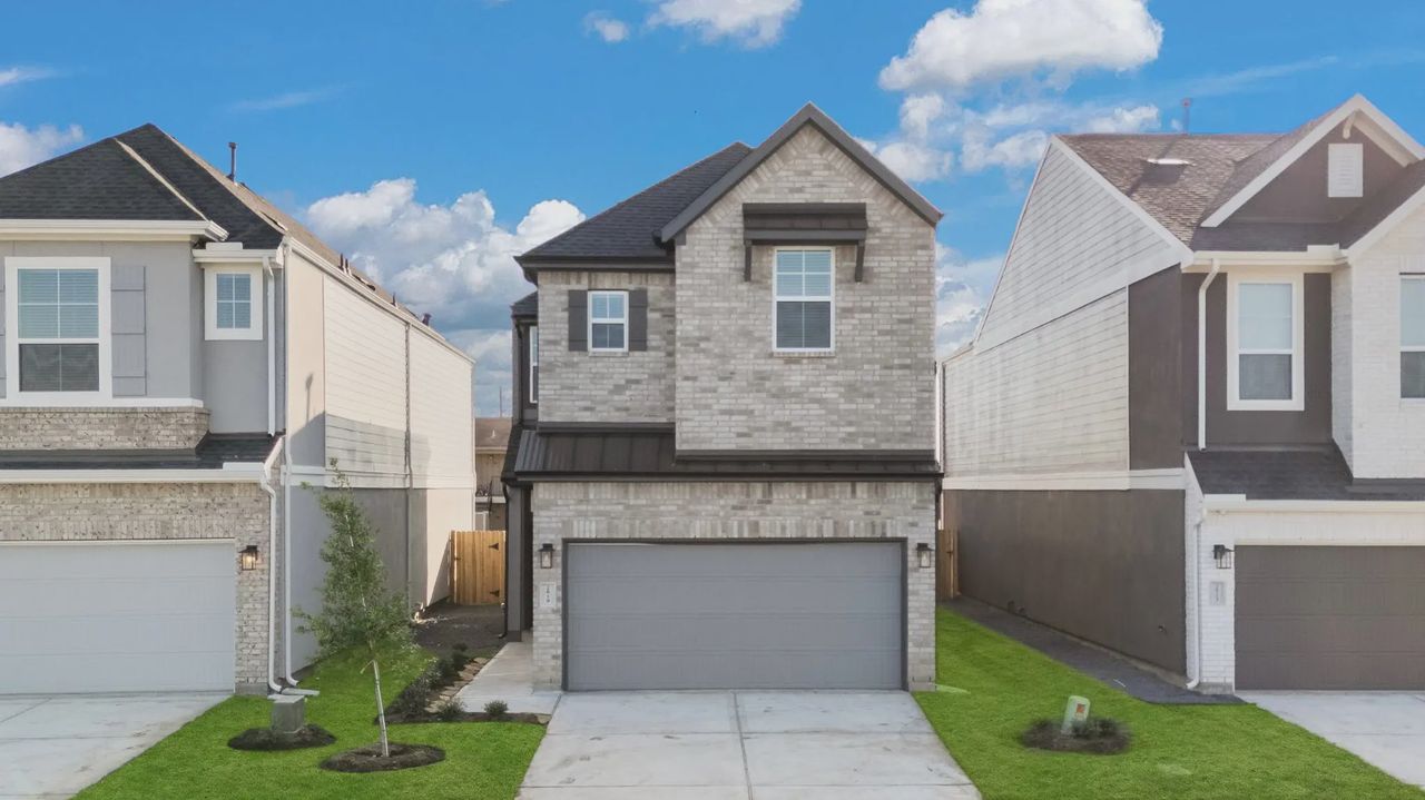 Representative exterior photo of a completed home built from the Cheverny by Chesmar Homes in Jordan Ranch Chateau and Courtyard, Fulshear, TX (Image 2).
