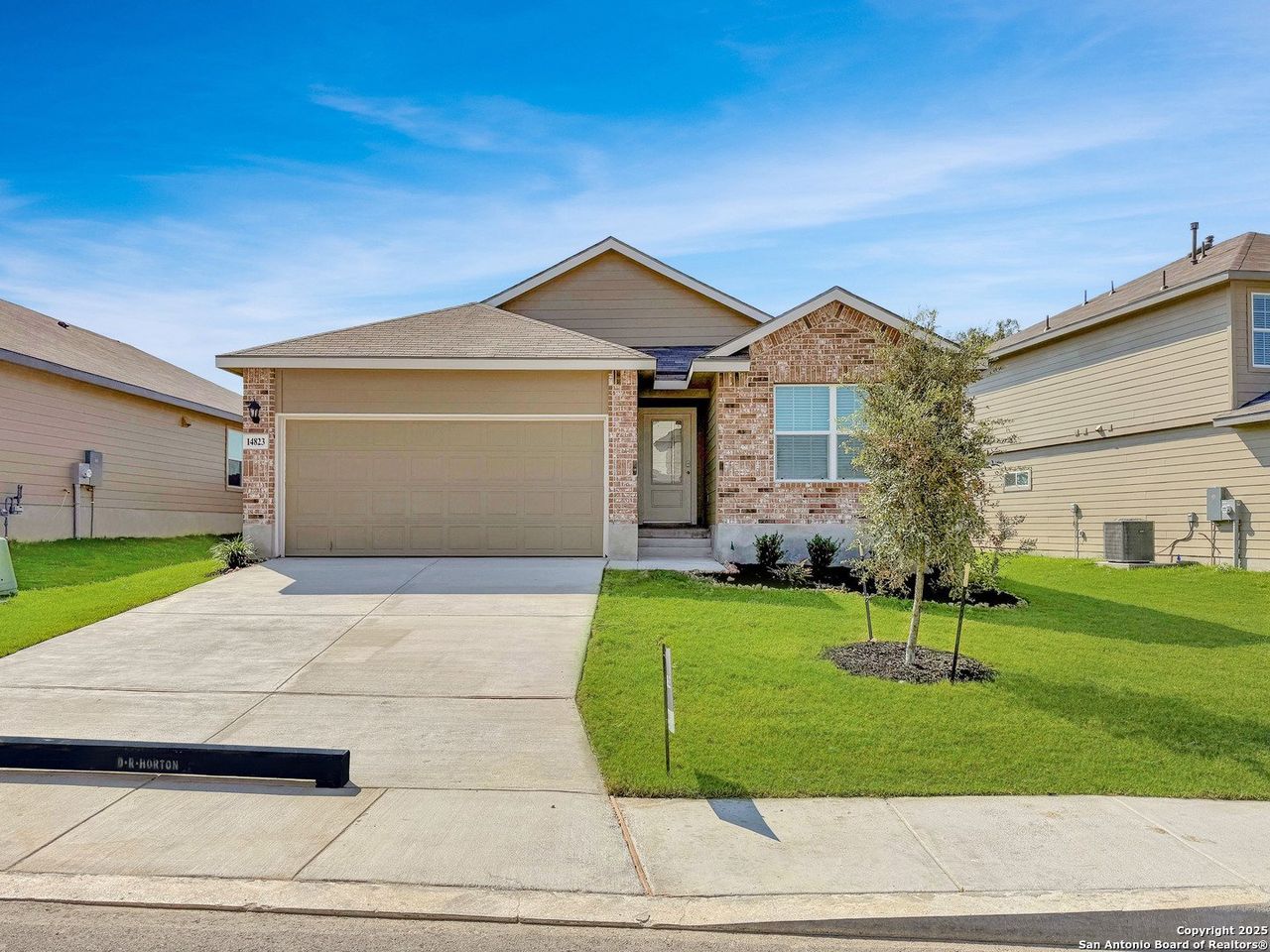 Front exterior of a new home in Riverstone at Westpointe, San Antonio, TX, highlighting curb appeal (Image 2). Front exterior of a new home in Riverstone at Westpointe, San Antonio, TX, highlighting curb appeal (Image 2).