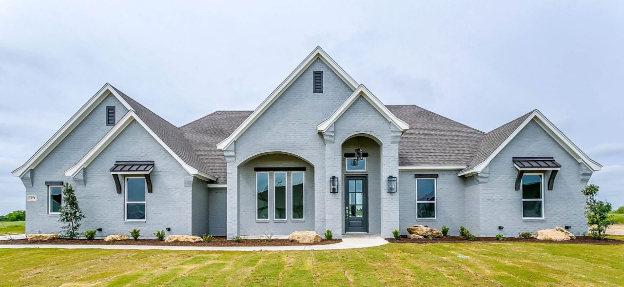 Representative exterior photo of a completed home built from the 123-2495-0719 by Abba River Homes in Stanford Estates, Springtown, TX (Image 2). Representative exterior photo of a completed home built from the 123-2495-0719 by Abba River Homes in Stanford Estates, Springtown, TX (Image 2).