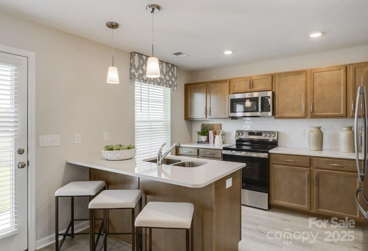 Furnished interior view inside a new home in Sloan Station, Charlotte (Image 2).