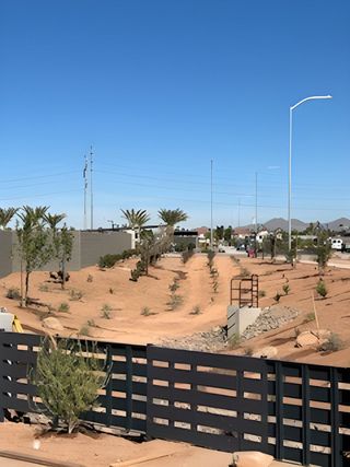 A scenic desert landscape with modern infrastructure in Hawes Crossing: Discovery by Lennar (Mesa, AZ).