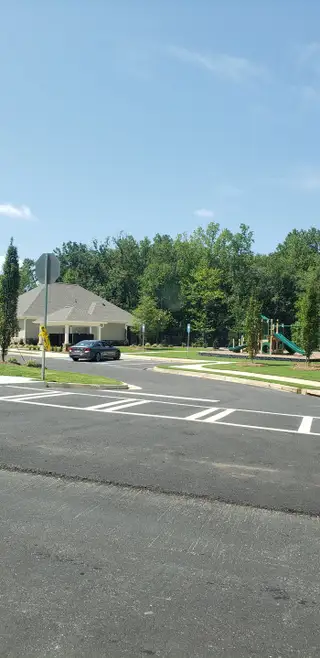 Community amenities with a playground nestled in Butner Estates by D.R. Horton in South Fulton, GA.