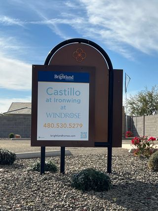 Community Amenities Brightland Homes presents an inviting entry at IronWing at Windrose in Litchfield Park, AZ, guiding you home.
