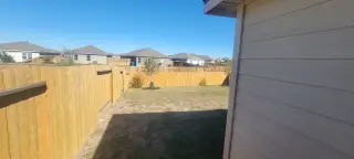 A cozy fenced backyard perfect for relaxation in Preserve at Medina by LGI Homes (San Antonio, TX).