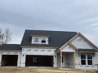 A charming new build with a classic gable roof in Timothy Lakes by Center Park Homes (Ridgeville, SC).