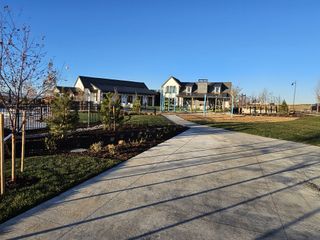 Community Amenities A charming clubhouse with modern design and play area in Westerly by Brightland Homes (Erie, CO).