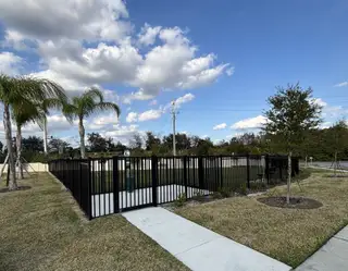 Community Amenities A fenced dog park in Emerald Pointe by Pulte Homes (Apopka, FL).