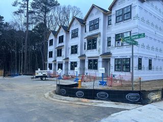 New townhomes under construction with modern design in Crescent Townes by Lennar (Raleigh, NC).