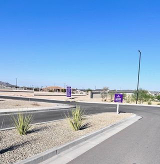 A vibrant community entrance at The Vistas Collection at Village at Sundance by Century Communities in Buckeye, AZ.