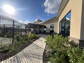 Modern community center with sleek architecture and landscaped surroundings in Marvida Trails South by KB Home (Cypress, TX).