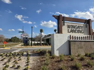Contemporary community entrance with landscaped details at Wingate Landing by Pulte Homes in Jacksonville, FL.