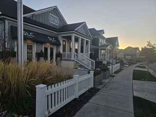 Charming homes with inviting porches and manicured landscaping in Westerly by SLC Homes (Erie, CO).