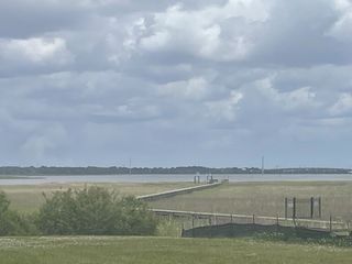 Street view A serene waterfront view with expansive skies in The Settlement at Ashley Hall by Homes by Dickerson (Charleston, SC).