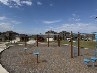 A charming playground view in Firefly Pointe: Stonehill Collection by Lennar, nestled in a lovely neighborhood in Hutto, TX.