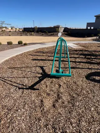 A fun playground area in Mason Ranch ll by D.R. Horton, surrounded by open spaces in Surprise, AZ.