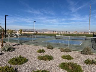 A beautiful outdoor sports court with mountain views in Harvest at Citrus Park by Landsea Homes (Goodyear, AZ).
