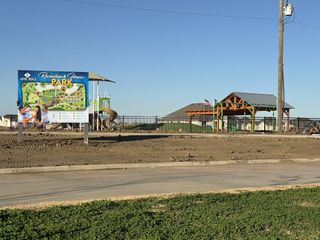 Charming park with playground and gazebo in Mason Ranch II by New Home Co. (Surprise, AZ). Perfect for recreation and fitness.
