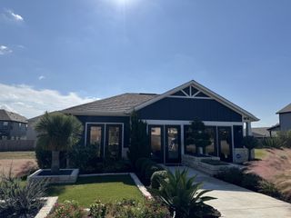 A charming modern home with lush landscaping in Eastwood at Sonterra by Pacesetter Homes (Jarrell, TX).