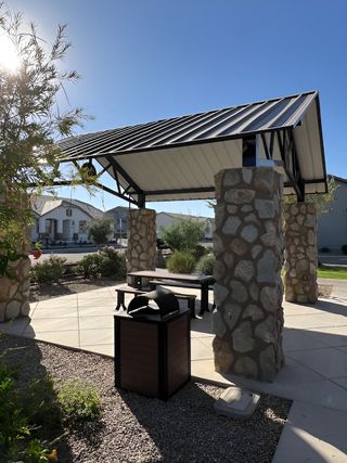 A charming stone column pavilion in Los Cielos at Rancho Mercado by Taylor Morrison (Surprise, AZ).