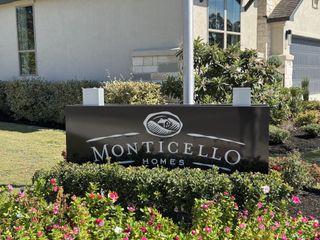 Monticello Homes presents elegant residences surrounded by lush landscaping in Highland Village, Georgetown, TX.