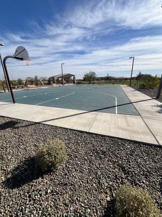 A modern outdoor basketball court in Tirreno at IronWing by Beazer Homes, Litchfield Park, AZ.