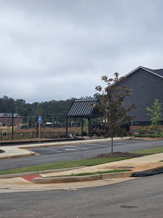 Modern amenities and lush surroundings in Fern Dale by Dream Finders Homes (Fairburn, GA).