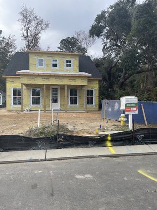 A charming new build with classic windows in Pineland Village by Center Park Homes (Summerville, SC).