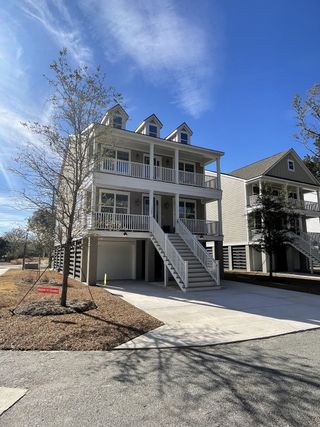 A charming multi-story home with a spacious porch in Wando Forest by J.Meyer Homes (Mount Pleasant, SC).