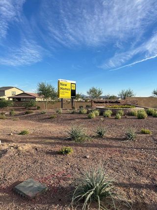 New homes in Ventana de Estrellas Traditions by KB Home, Goodyear, AZ, showcased in a serene desert landscape.
