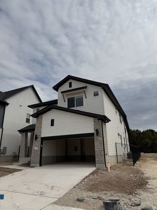 A modern two-story home with a spacious garage in Foxfield by Milestone Community Builders (Austin, TX).