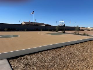 A modern outdoor basketball court in North Copper Canyon by Oakwood Homes Co, located in Surprise, AZ.