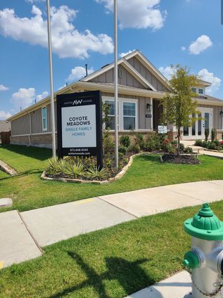 Model Home A charming home with manicured lawns in Coyote Meadows 40s by Ashton Woods (Anna, TX).