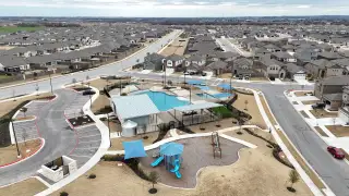 Community Amenities A bird’s-eye view showcasing the beautifully planned neighborhood, pool, and recreational areas.