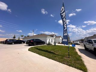 A picturesque street in Cascades by Lennar (Davenport, FL), featuring charming homes and ongoing new construction.
